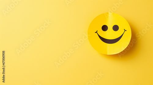 happy smiley face on yellow background with copy space 