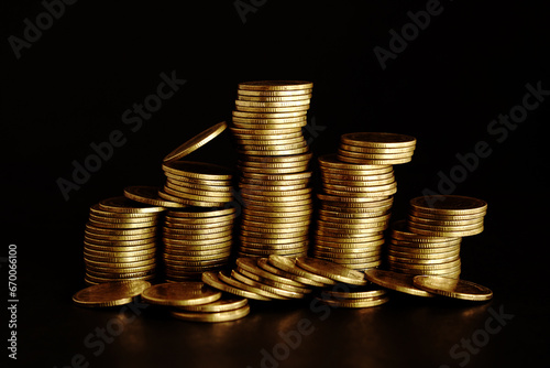 Gold coins on black background, Saving money concept