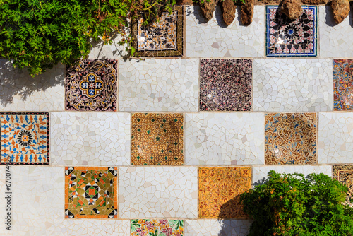 Photography Mosaic wall by Antoni Gaudi in the Park Guell in Barcelona, Catalonia, Spain