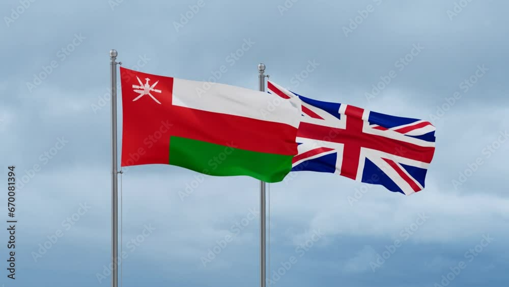 United Kingdom and Oman flag waving together on cloudy sky, endless seamless loop, two country cooperation concept United Kingdom and Oman flag waving together on cloudy sky, endless seamless loop, two country cooperation concept