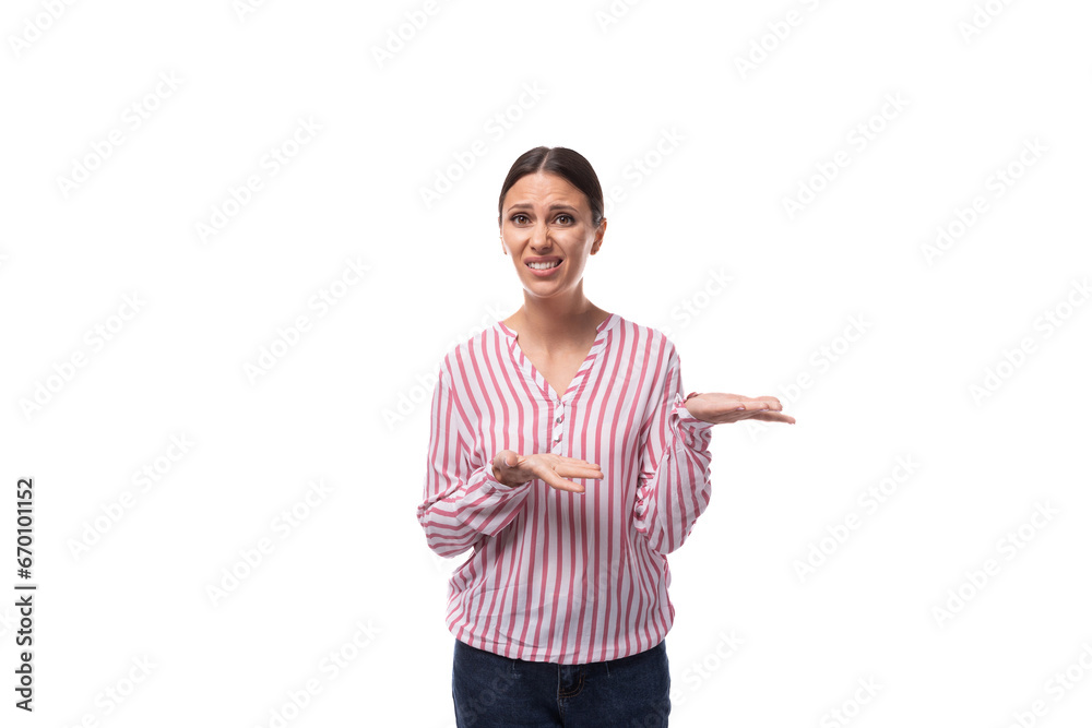 young successful smart brunette business woman dressed in a striped shirt on a white background with copy space young successful smart brunette business woman dressed in a striped shirt on a white background with copy space