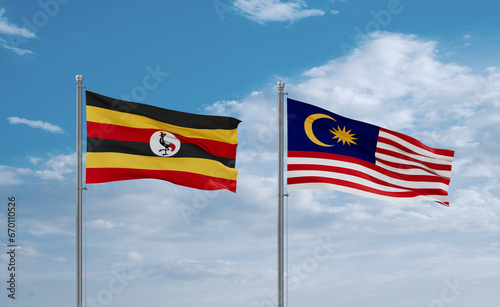 Malaysia and Uganda flags, country relationship concept