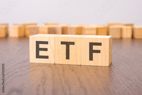 etf text on wooden blocks. wooden background. foreground