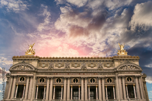 Opera Garnier (Garnier Palace) against the background of a beautiful sky at sunset, Paris, France. Translation: national Academy of Music. UNESCO World Heritage Site