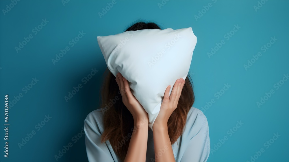 photo of woman covering her face with pillow - obrazy, fototapety, plakaty 