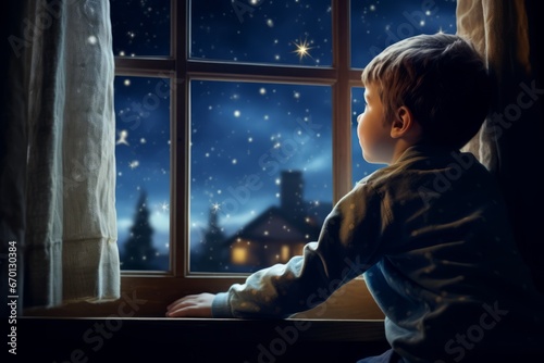 Wallpaper Mural A young boy in his cozy winter pajamas, standing by the window, gazing at the starry night sky with anticipation, waiting for Santa Claus on Christmas Eve Torontodigital.ca