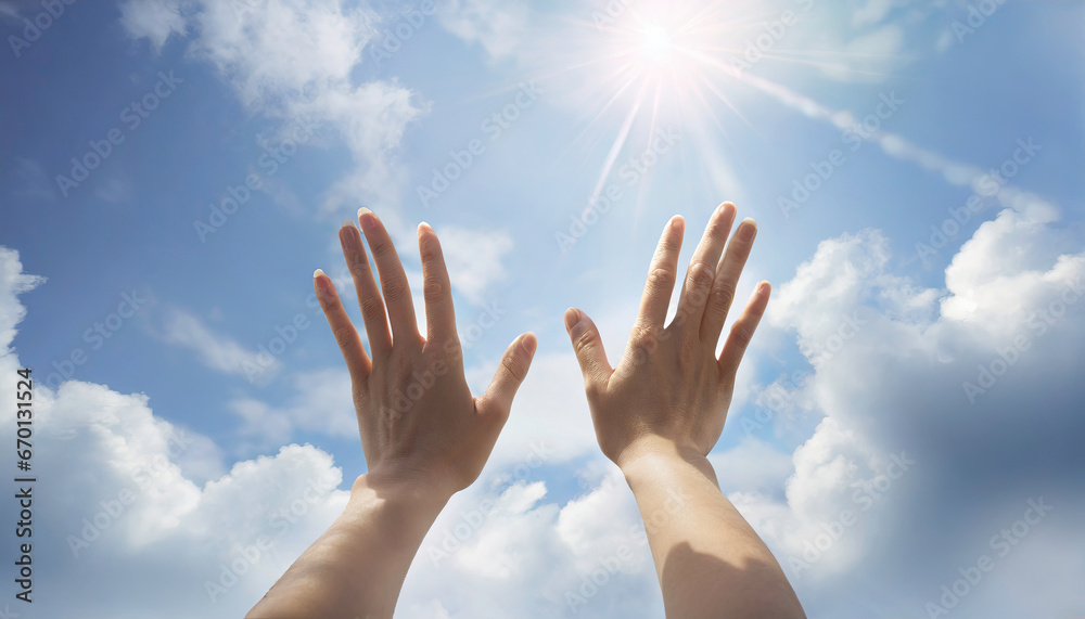 Hands praying to the God in the sky Hands praying to the God in the sky