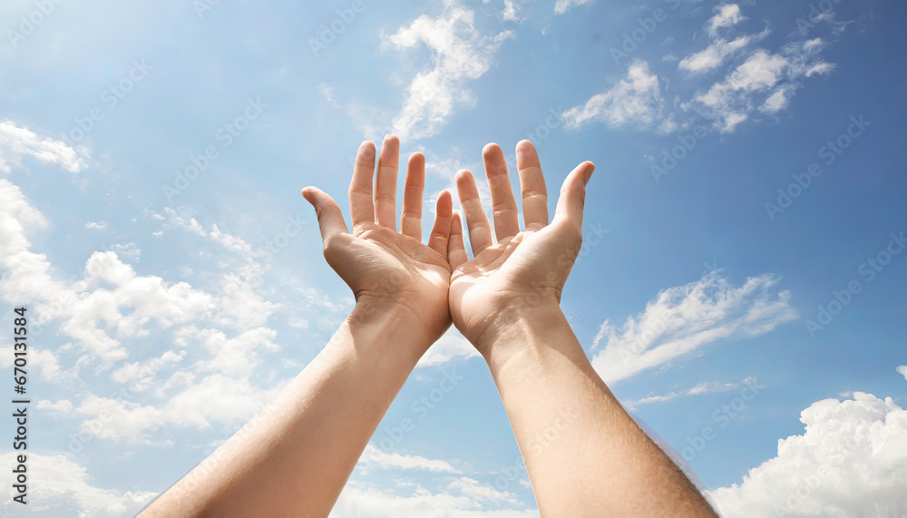 Hands praying to the God in the sky Hands praying to the God in the sky