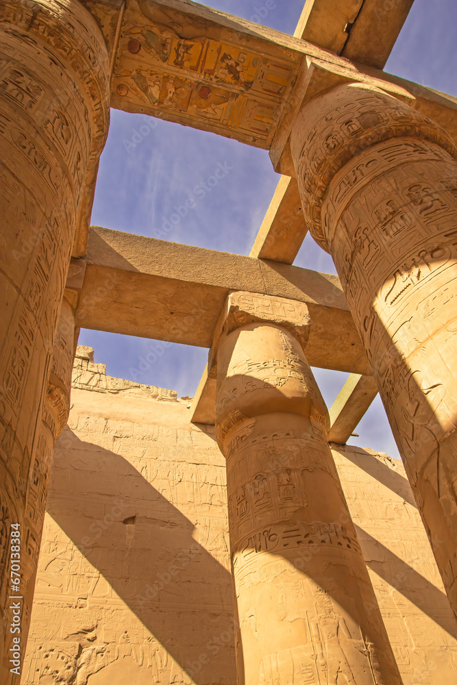 Great Hypostyle Hall and blue sky in the backgrouns at the Temples of Karnak (ancient Thebes). Luxor, Egypt.  Vertically. 