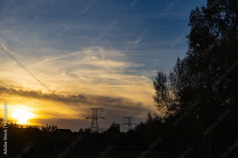 High voltage power line. Landscape at sunset