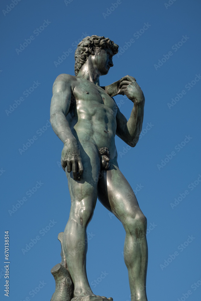 Michelangelo's David bronze statue in a public square of Florence, Italy Michelangelo's David bronze statue in a public square of Florence, Italy