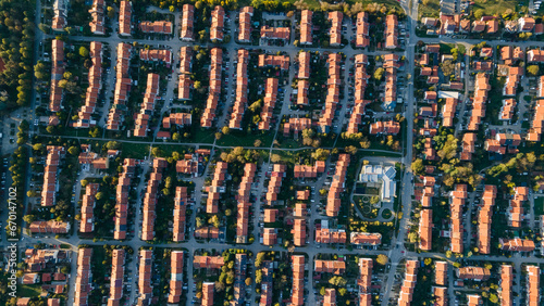 Thousands of houses aerial birds eye view suburb housing development new neighborhood in Europe modern architecture and design. Aerial view of suburban houses in new modern development area