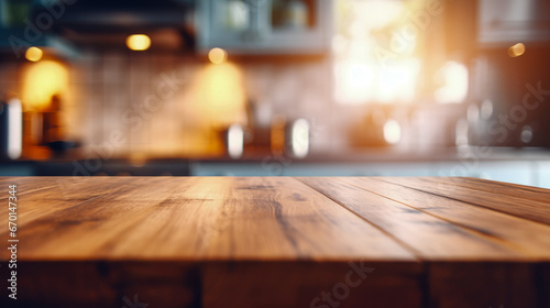 Wood countertop in modern kitchen with blurred background. Template for product display. © PixelGallery