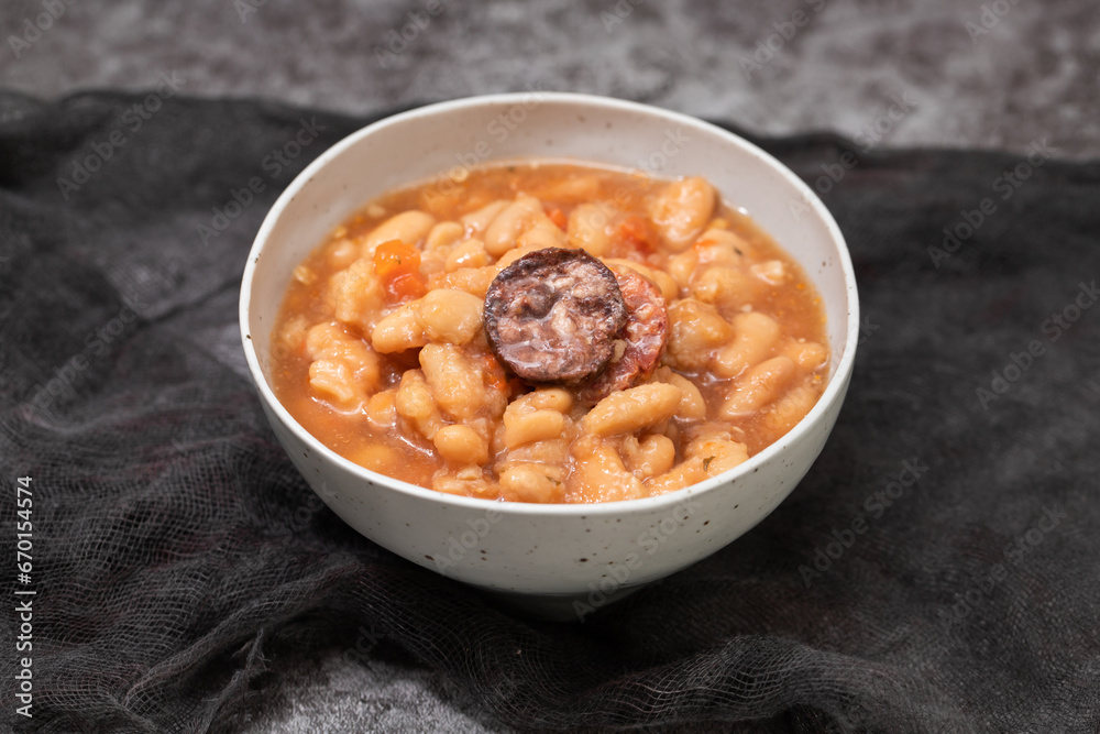 typical portuguese dish dobrada with beans in ceramic bowl typical portuguese dish dobrada with beans in ceramic bowl