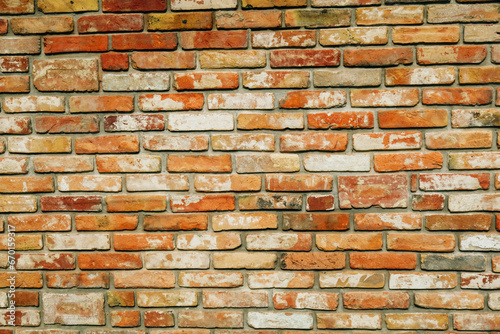 Brick wall. Brick texture. Background made of vintage, antique, red bricks.