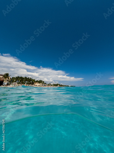 Turquoise Caribbean sea with underwater view. Beautiful tropical 