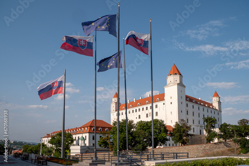 Photography The flags of the European Union and the Slovak Republic fly in front of the Bratislava Castle building