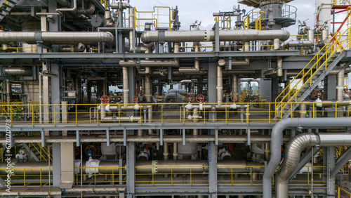 Closeup of chemical industrial pipelines of a petrochemical ship or oil rig