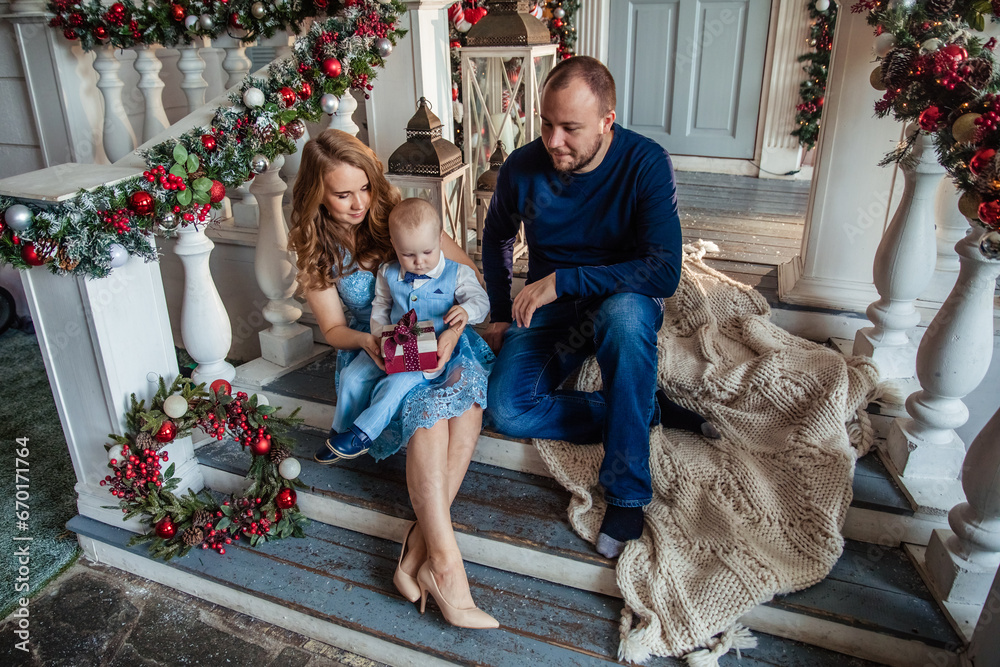 New Year's or Christmas Eve with happy family with child New Year's or Christmas Eve with happy family with child