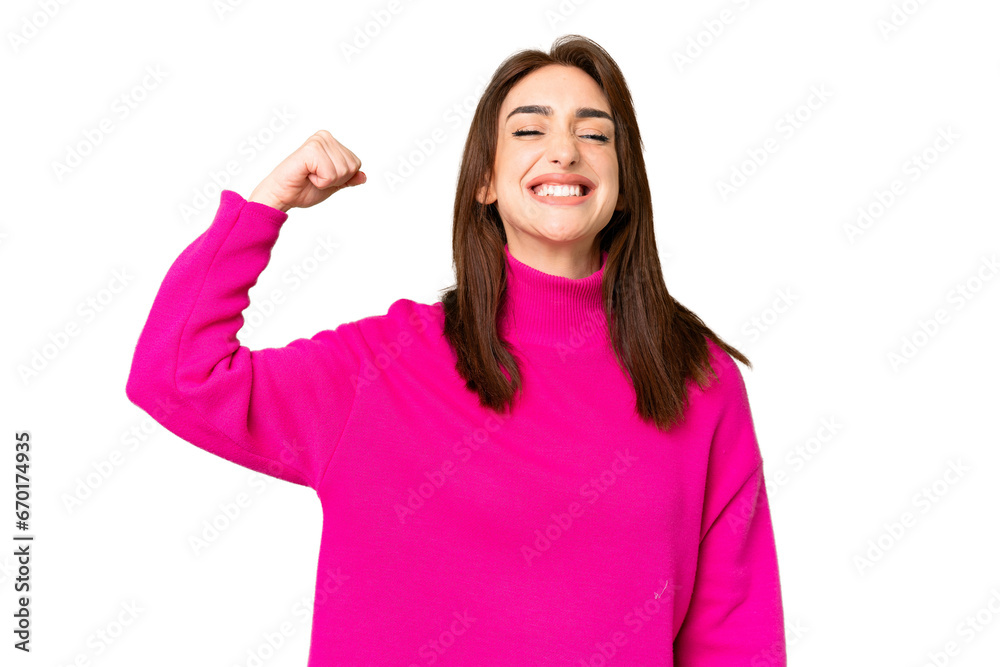 Young caucasian woman over isolated chroma key background doing strong gesture Young caucasian woman over isolated chroma key background doing strong gesture