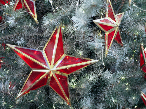 Christmas and new year decorations on the Christmas tree, close-up, holiday concept. New year and Christmas decoration, holiday atmosphere.