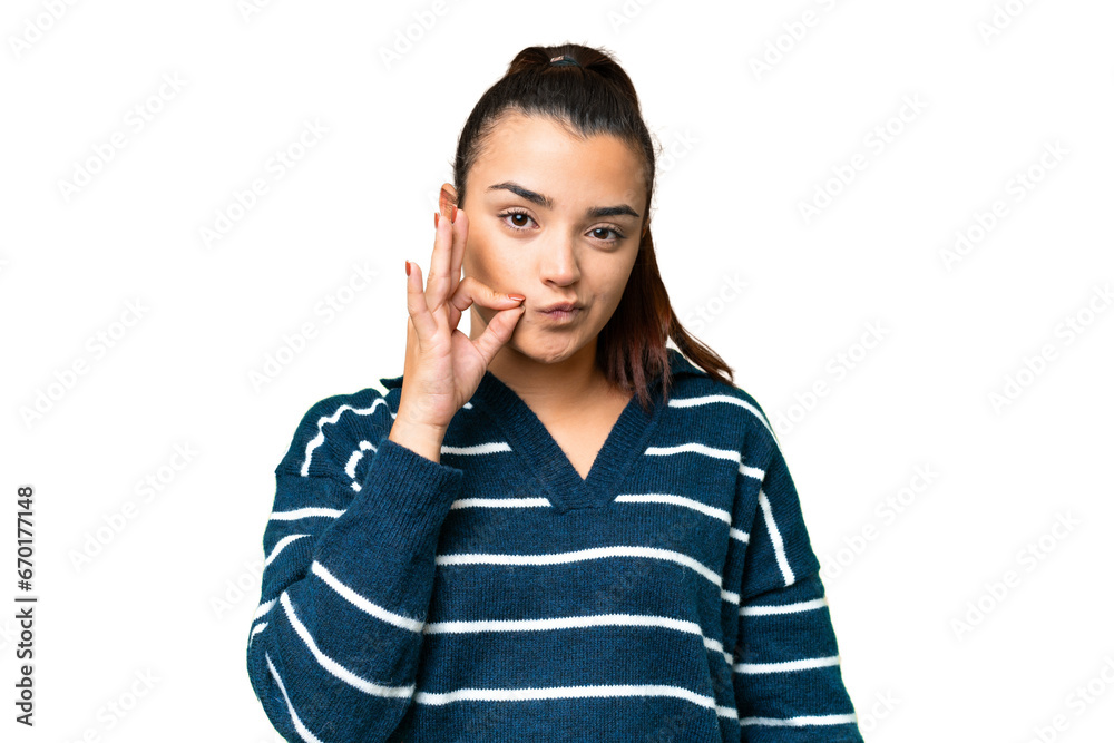 Young beauty woman over isolated chroma key background showing a sign of silence gesture Young beauty woman over isolated chroma key background showing a sign of silence gesture
