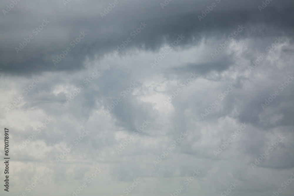 Gray stormy sky with clouds. Cloud texture, background. Gray stormy sky with clouds. Cloud texture, background.