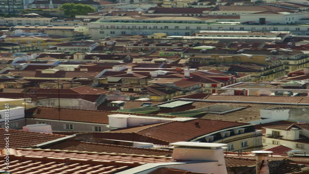 Panning shot of rooftops in cityscape - vertical video / Lisbon, Lisboa, Portugal Panning shot of rooftops in cityscape - vertical video / Lisbon, Lisboa, Portugal