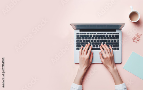 Top view of woman hands typing, using keyboard of a laptop computer for online shopping, learning, design, email. Copy space for text, advertising, message, logo
