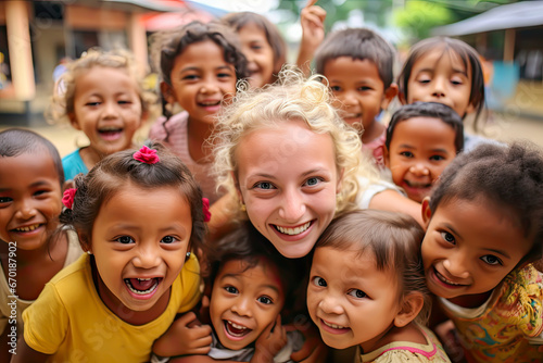 Volunteer at an orphanage bring smiles. social responsability concept