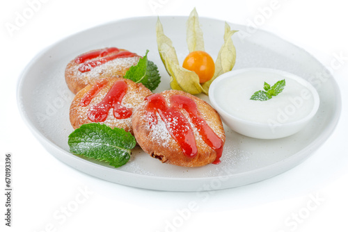 cottage cheese pancakes with jam and sour cream on a white background for a food delivery site 4