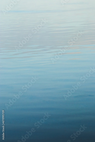 beautiful peacefull blue calm water background from a morning in the beach of puerto rico photo