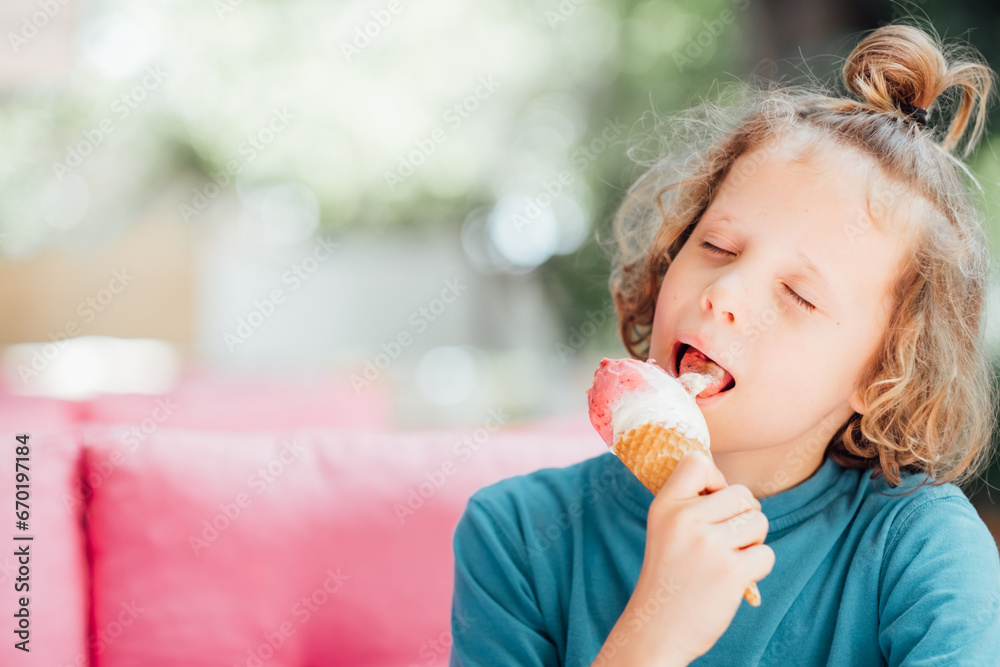 Portrait of boy with closed eyes eating cone ice cream. Child licking ice cream and enjoying summer dessert. Portrait of boy with closed eyes eating cone ice cream. Child licking ice cream and enjoying summer dessert.