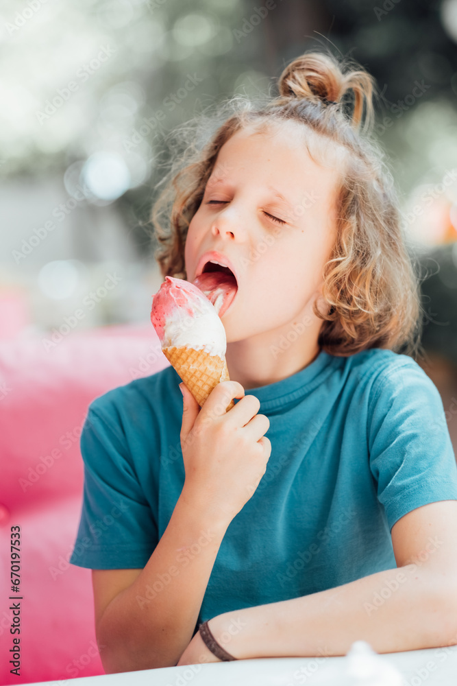 Portrait of boy eating cone ice cream. Child licking ice cream. Portrait of boy eating cone ice cream. Child licking ice cream.