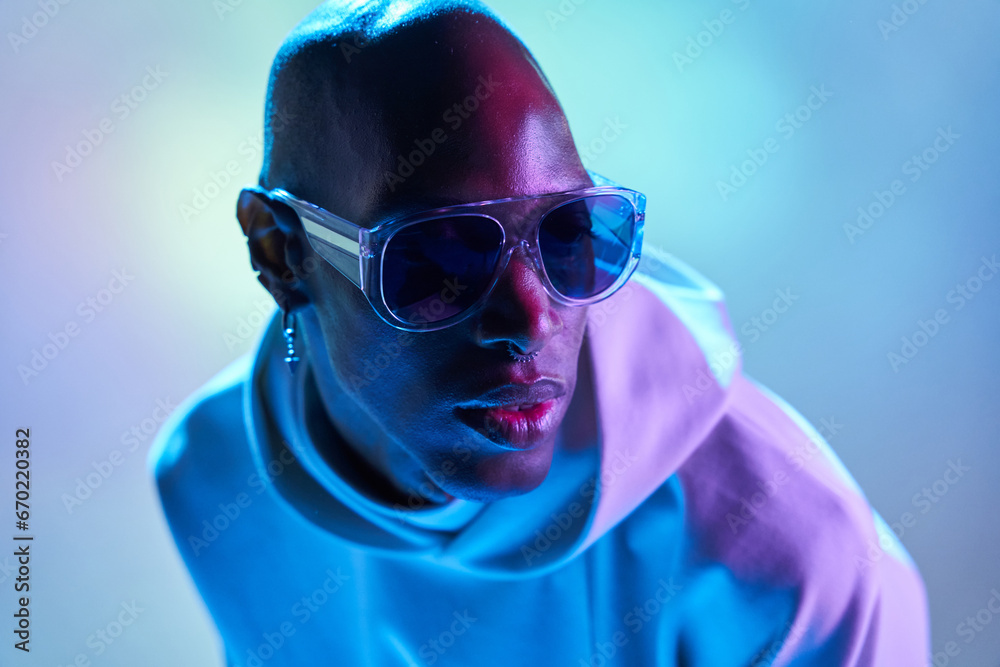 Stylish black young man with sunglasses in studio Stylish black young man with sunglasses in studio