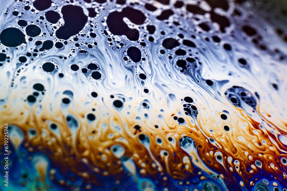 Beautiful psychedelic abstraction formed by light on the surface of a soap bubble Beautiful psychedelic abstraction formed by light on the surface of a soap bubble