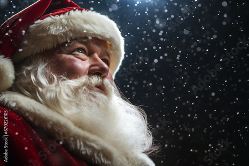 Generative AI illustration from below of happy Santa Claus with a full white beard and twinkling eyes smiles warmly, with snowflakes gently falling in the background against a dark night sky photo