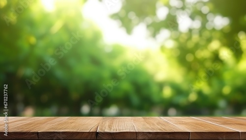 wooden table with ,green  tree and sun ray droplet bokeh for product presentation  © Klay