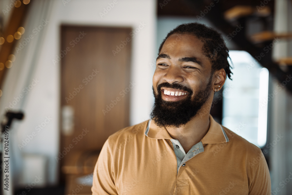 Portrait of happy black man looking away Portrait of happy black man looking away