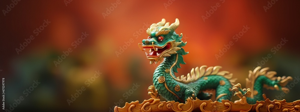 Obraz premium Green Chinese Dragon on blurred background. The year of the Dragon in China and Eastern Asia. One of the Chinese zodiac signs. New Year of the Dragon 2024