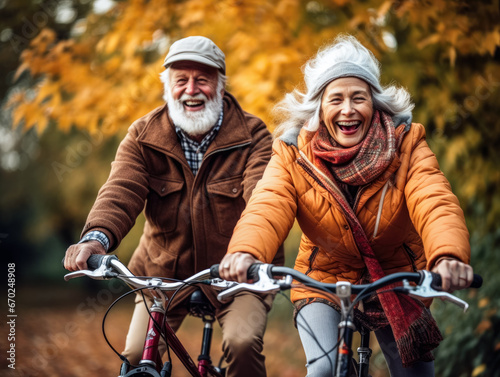 Senior couple, man and woman riding bicycles, smiling, autumn coloured trees background. Active lifestyle concept. Generative AI