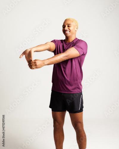 SPORTS MAN STRETCHING HAPPY AND FIT