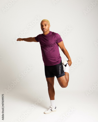 SPORTS MAN STRETCHING HAPPY AND FIT