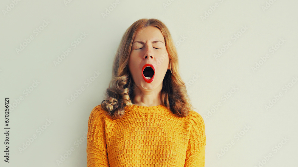 Sleepiness. Young tired woman yawns opens her mouth wide - obrazy, fototapety, plakaty 