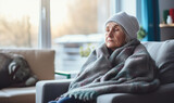A senior person wrapped up in a scarf and hat during winter. Cost of living Heating gas bill