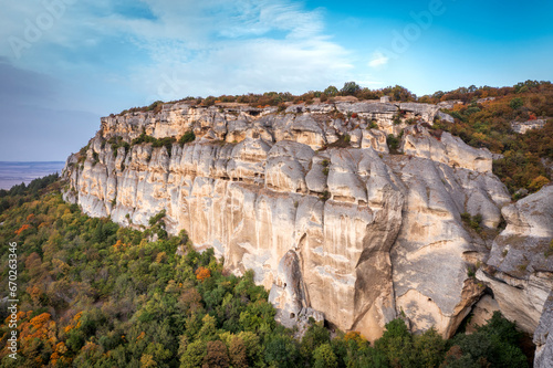 Towering cliffs in National Historical and Archaeological Reserve Madara. Thracian and roman fortress in Madara, near Shumen, Bulgaria. photo