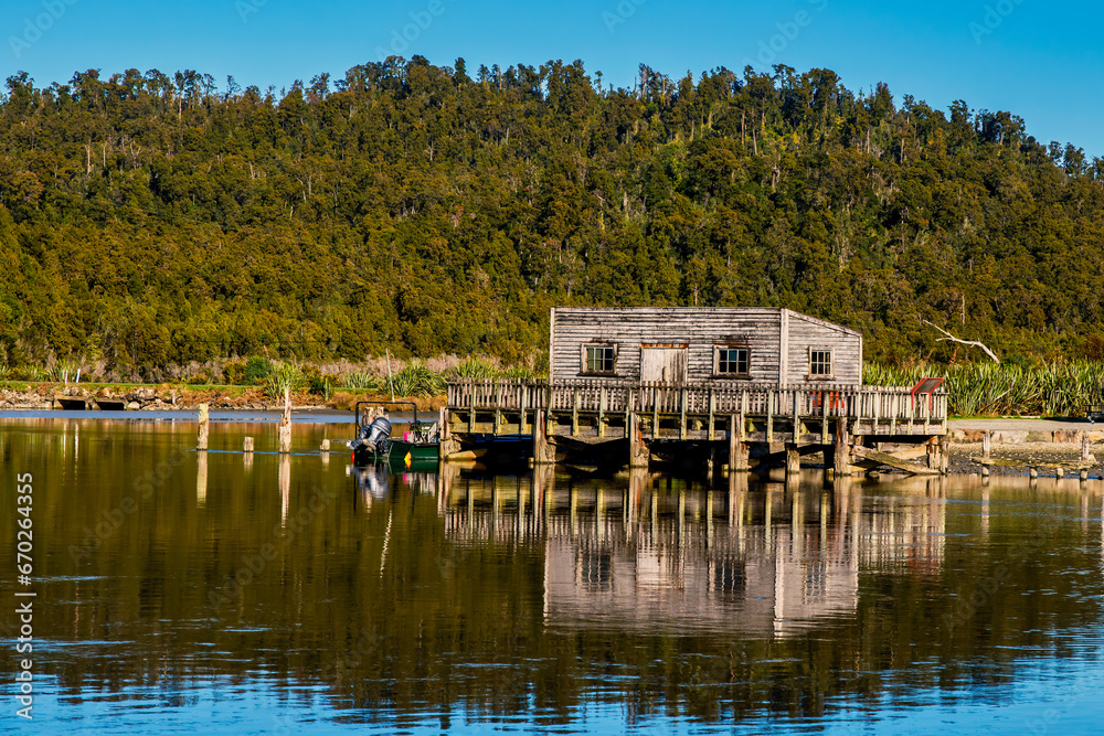 Obraz premium Okarito Lagoon is New Zealand's largest unmodified wetland. A coastal lagoon lined by the snow capped southern alps and the home to native birds