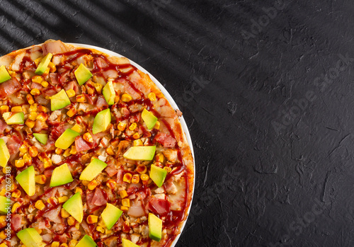 BBQ chicken pizza - Neapolitan sauce and cheese base. Fusion of chicken, bacon, corn, avocado with BBQ sauce