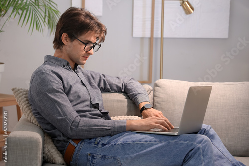 Young businessman sitting o...