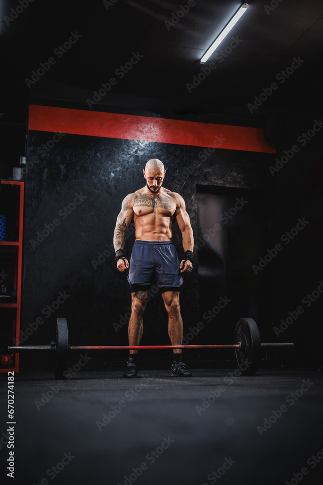 Bodybuilder Getting Ready To Weightlifting At The Gym Bodybuilder Getting Ready To Weightlifting At The Gym